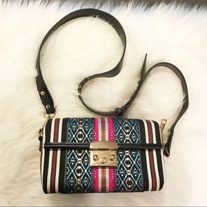 Small purse with faux leather arm strap